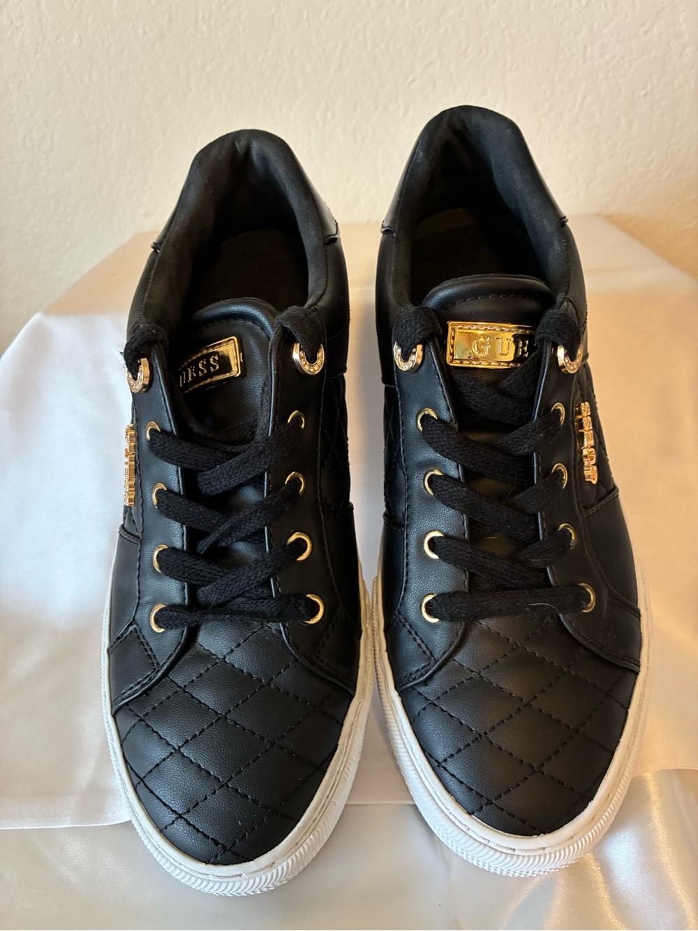 GUESS Women’s Black Quilted Low-Top Sneakers with Gold Hardware